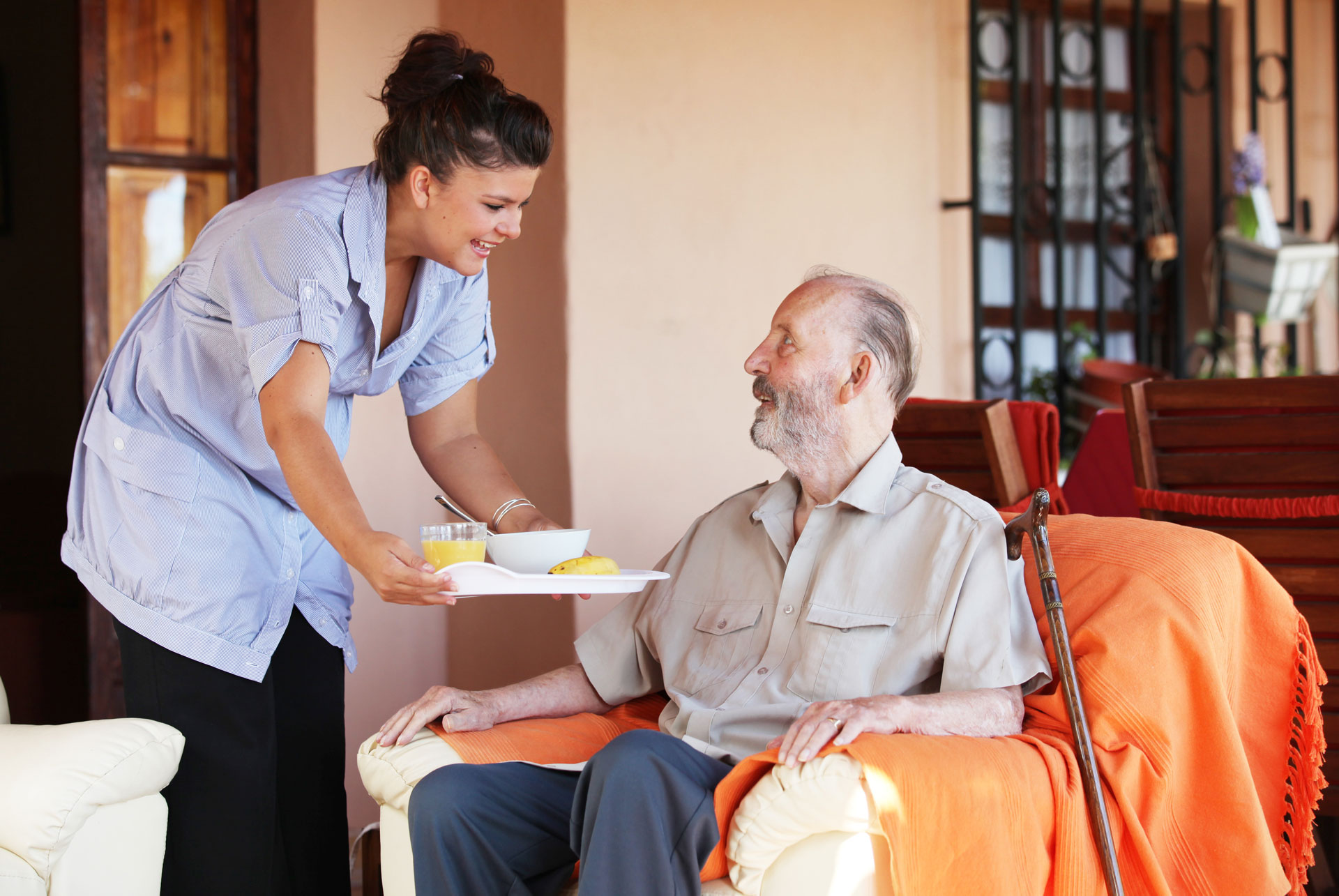 Older adult having a reassuring conversation at home
