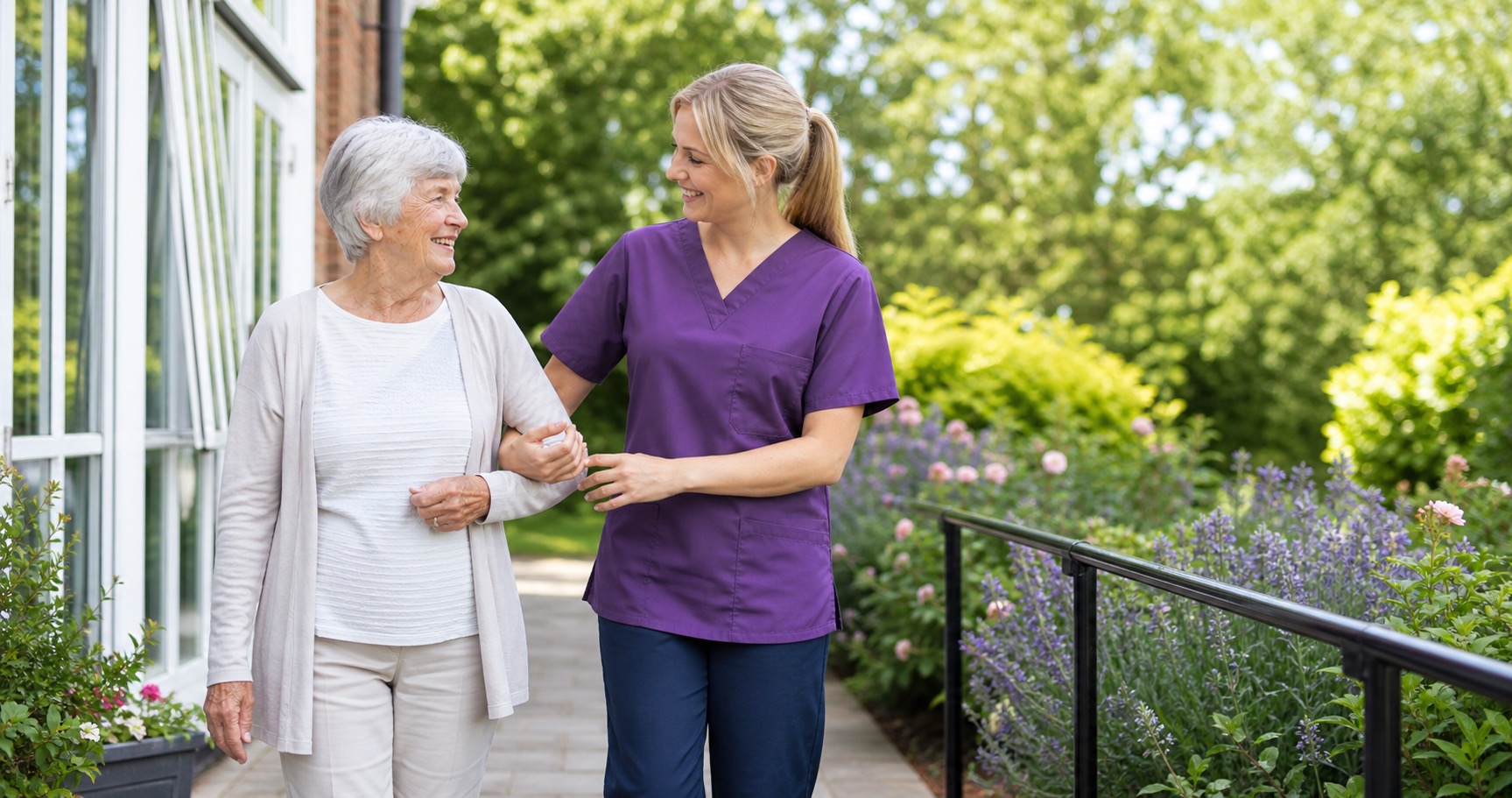 Support worker helping an older person enjoy community access outdoors